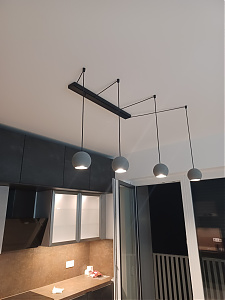 Dining Room Pendant - Due to the ceiling heating and the poor position of the original fixture, I had to compensate with a spider web design.