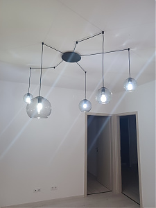 Spider Web Hanging Lamp - If we rely on the only connection option, the lamp would not have been placed above the coffee table, but at the corner of the sofa.